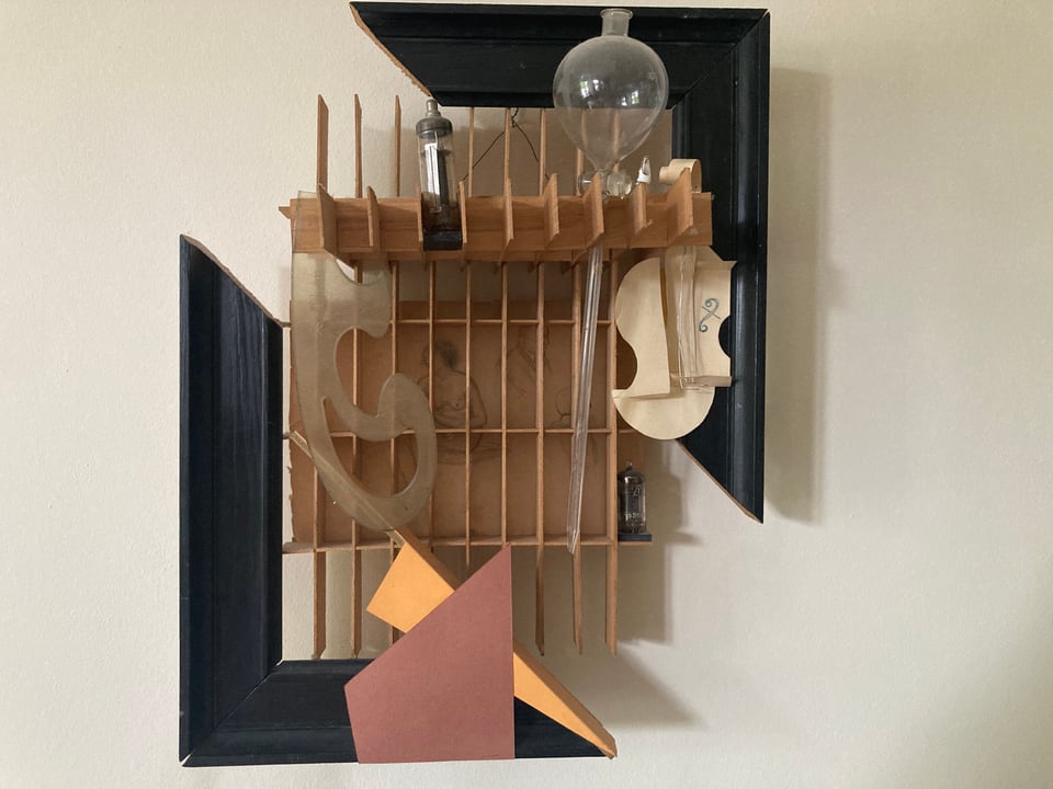 Michael Thomas Schröder, Untitled – object of two black frame parts, a type case, a glass flask, valves, a French curve and coloured card
